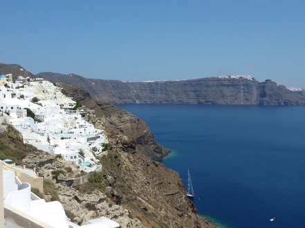 View of Oia Village and across Santorini to Fira